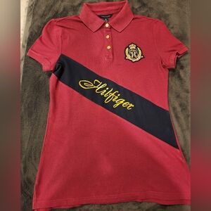 Tommy Hilfiger polo shirt in small size color is dark pink.